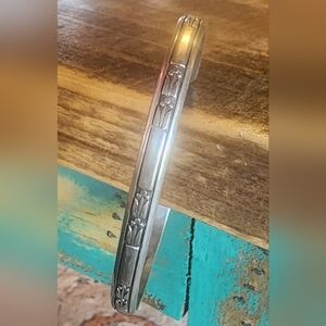 Signed 'calvin'   sterling silver stamped cuff bracelet